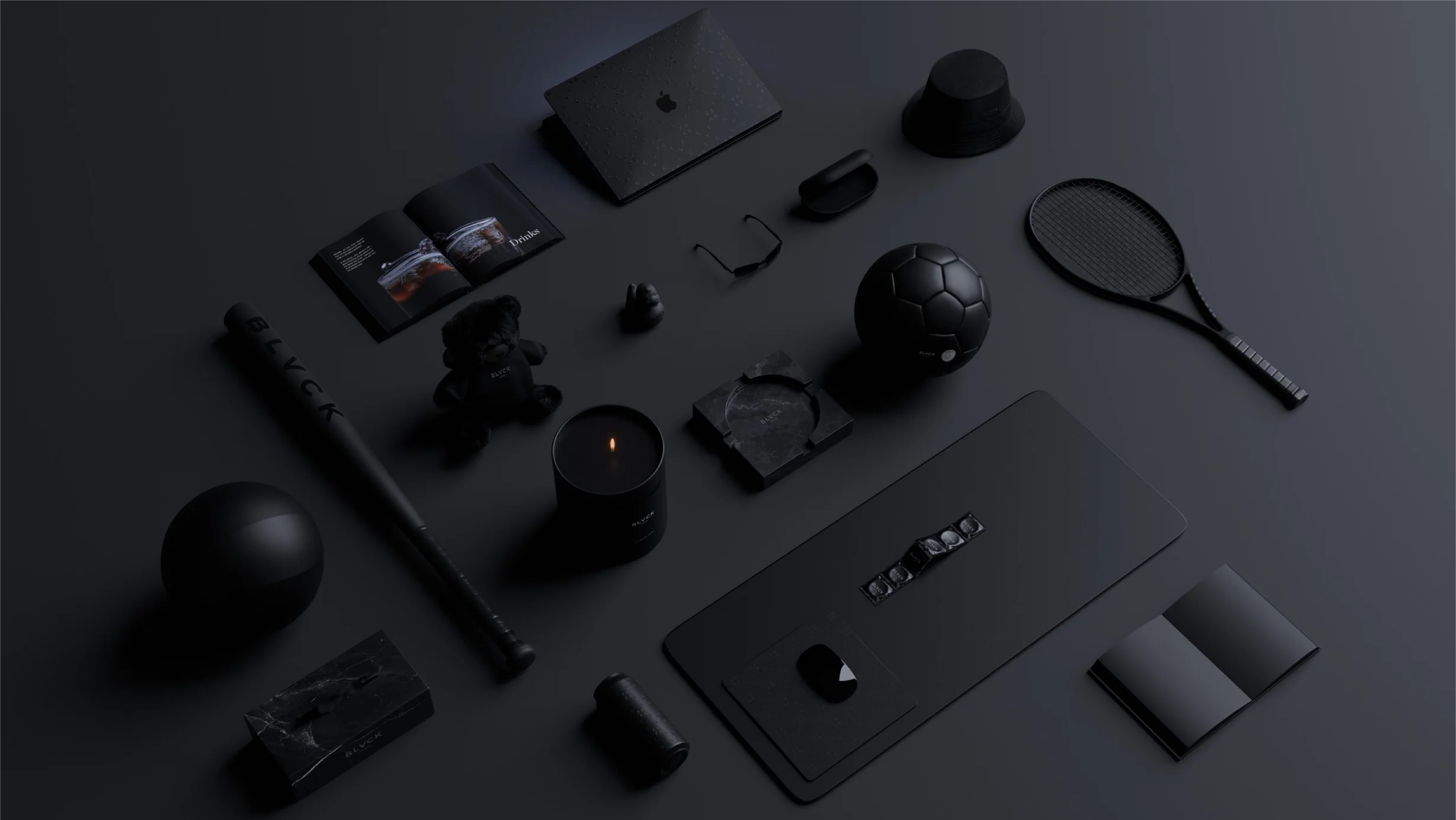 all black accessories in a flat-lay setup style